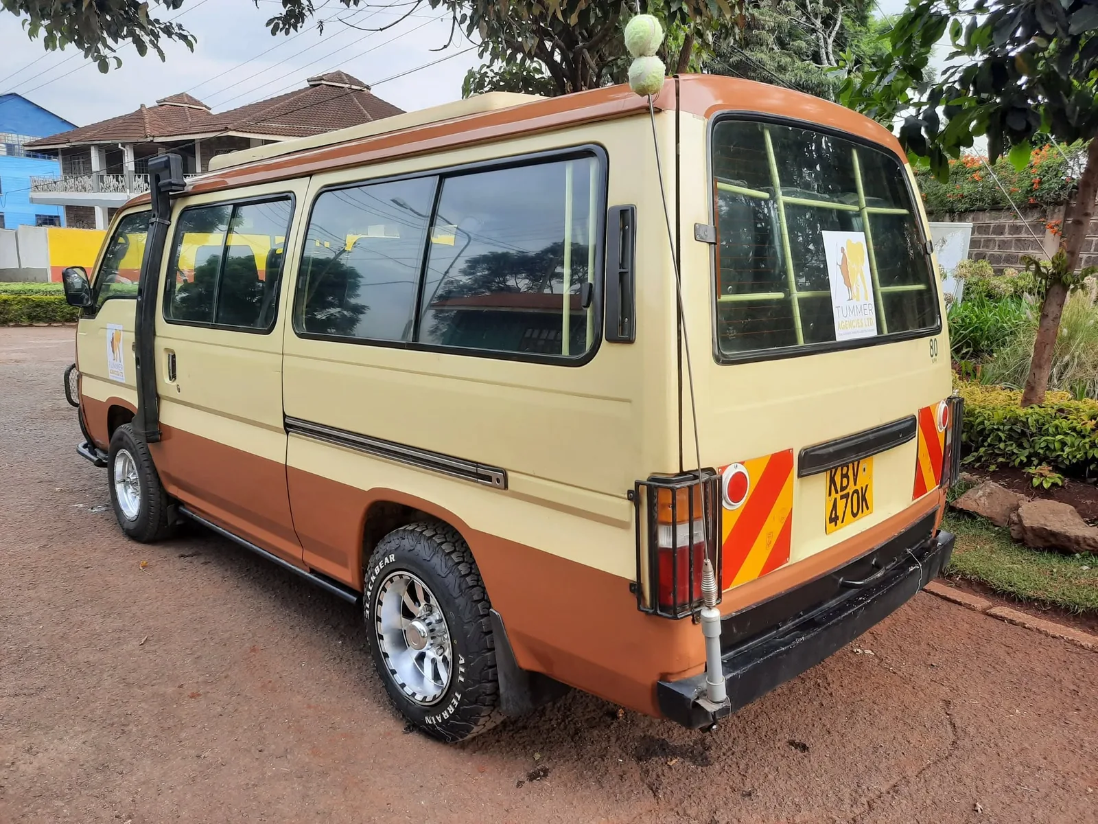 Tummer Agencies safari van, side profile at the depot